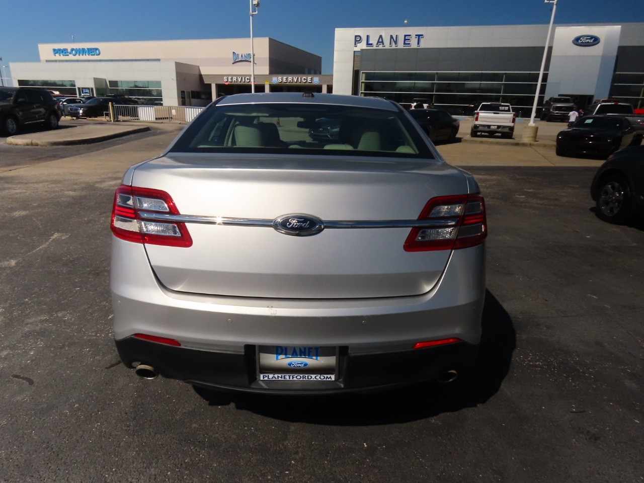 used 2015 Ford Taurus car, priced at $9,999