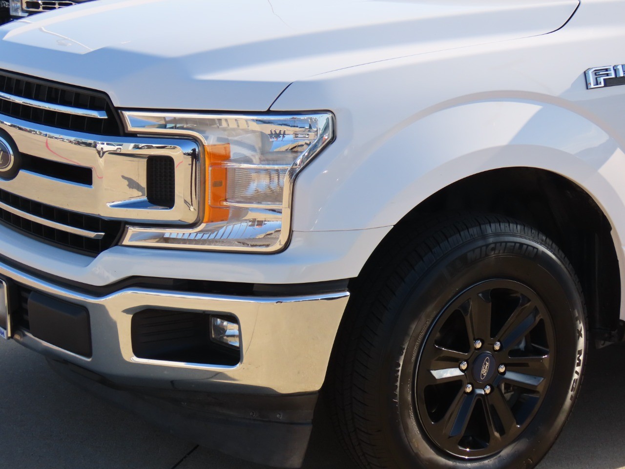 used 2019 Ford F-150 car, priced at $23,999