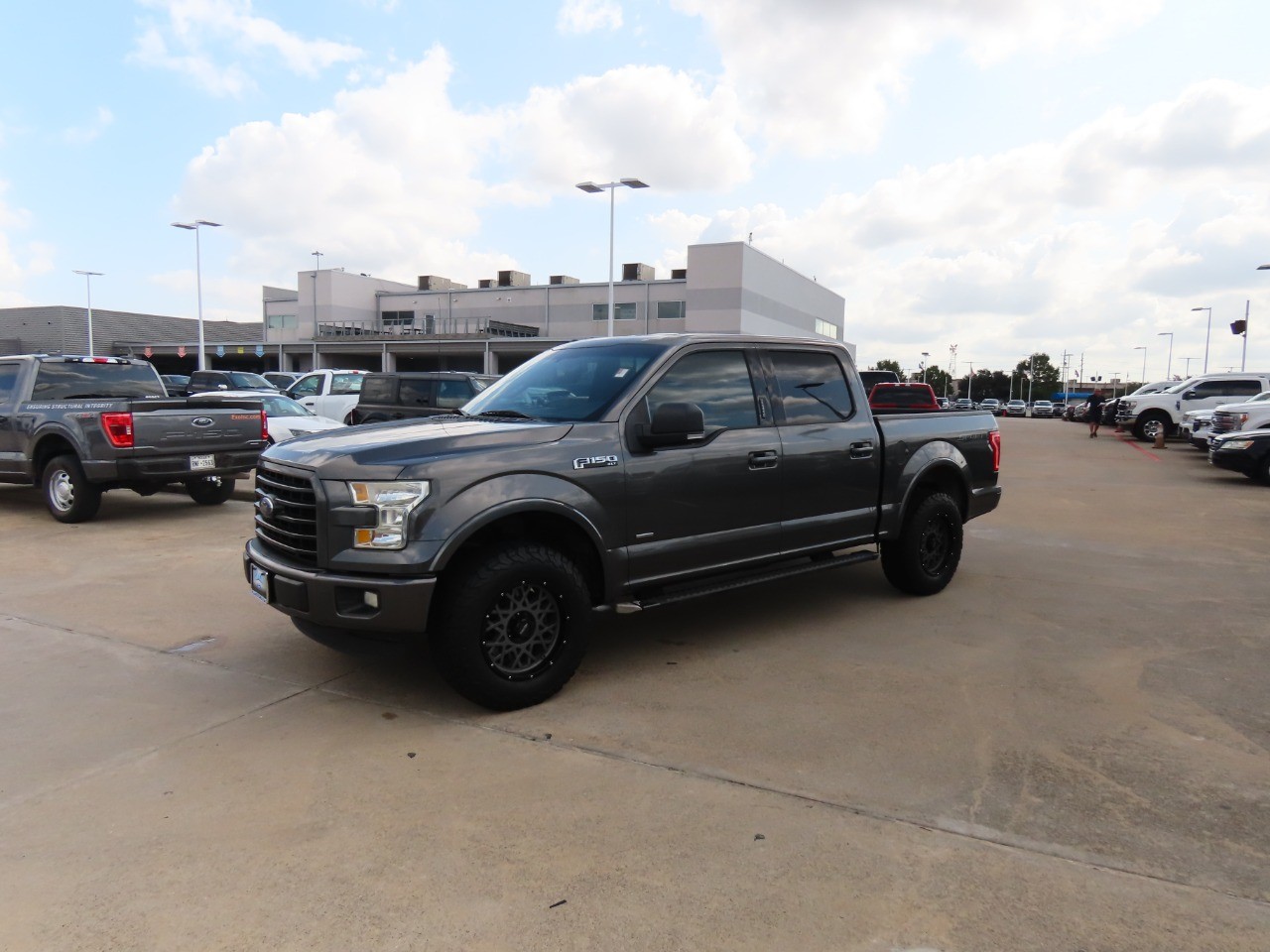 used 2016 Ford F-150 car, priced at $14,999