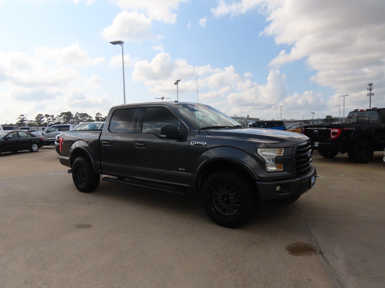 used 2016 Ford F-150 car, priced at $14,999