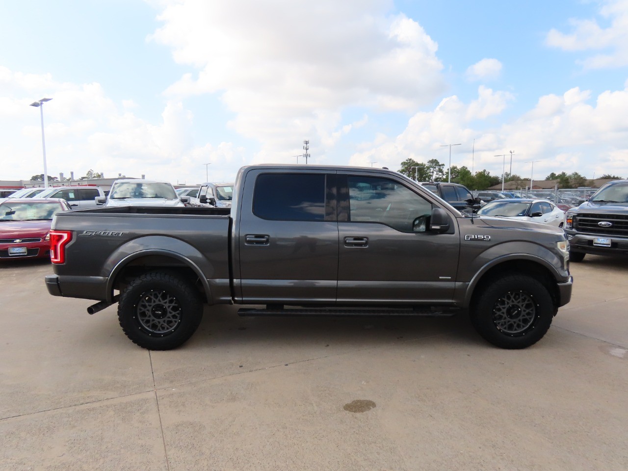 used 2016 Ford F-150 car, priced at $14,999