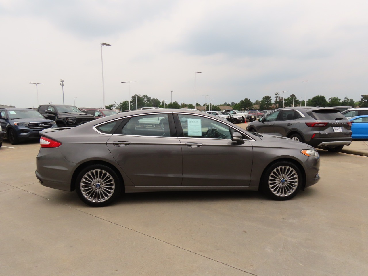 used 2013 Ford Fusion car, priced at $9,999