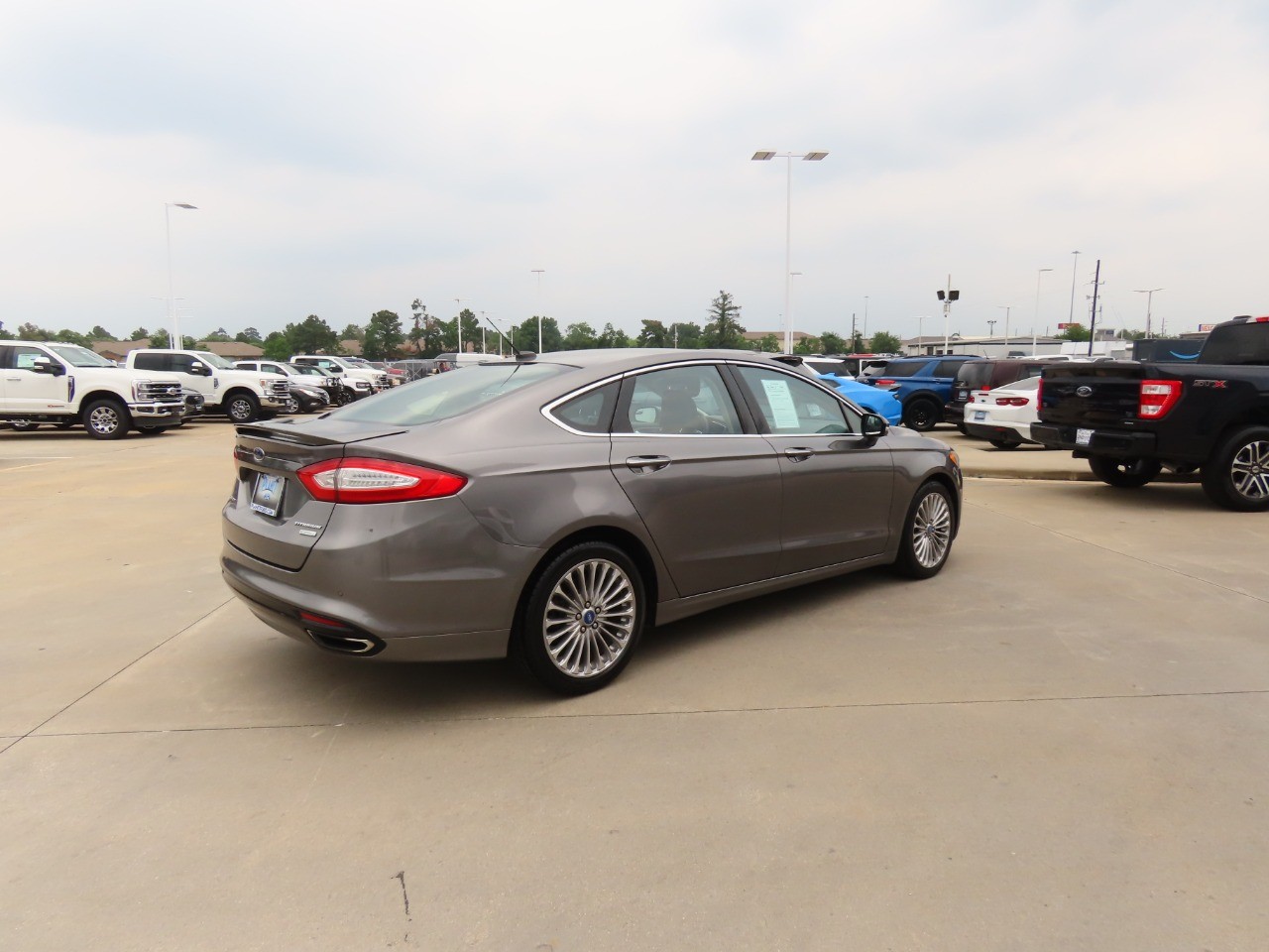 used 2013 Ford Fusion car, priced at $9,999