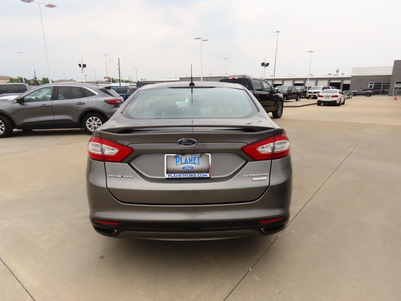 used 2013 Ford Fusion car, priced at $9,999