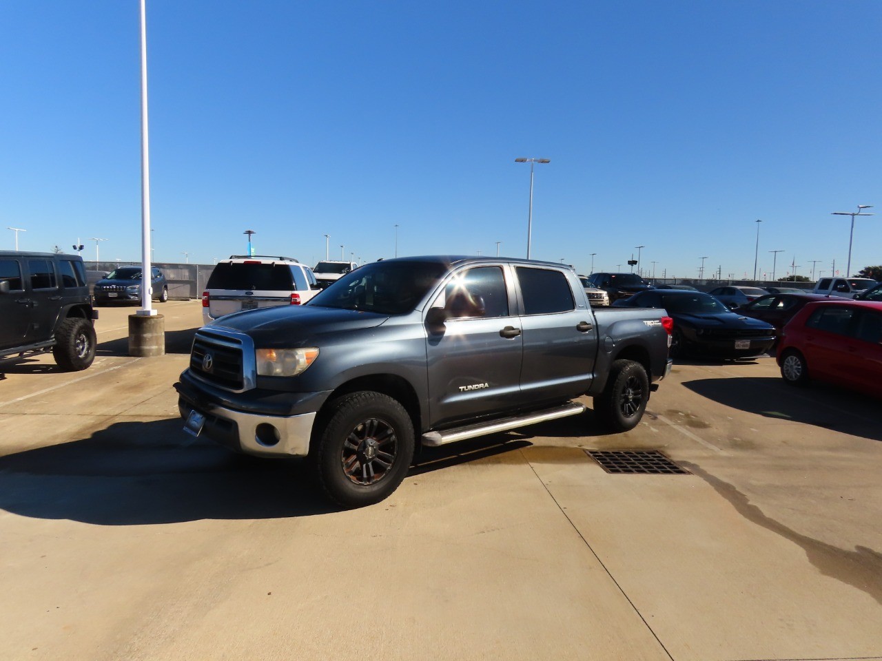 used 2010 Toyota Tundra 2WD Truck car, priced at $10,999