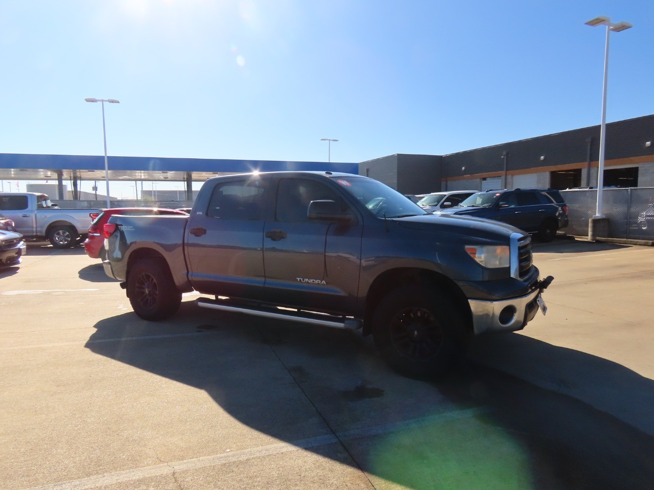 used 2010 Toyota Tundra 2WD Truck car, priced at $10,999