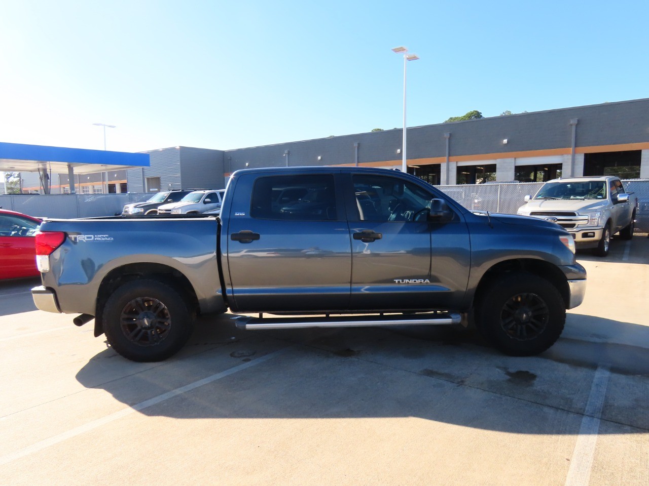 used 2010 Toyota Tundra 2WD Truck car, priced at $10,999