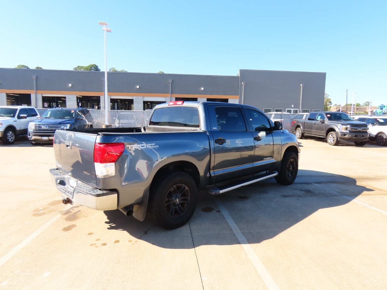 used 2010 Toyota Tundra 2WD Truck car, priced at $10,999