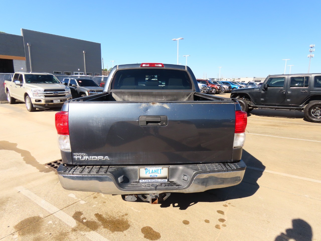 used 2010 Toyota Tundra 2WD Truck car, priced at $10,999