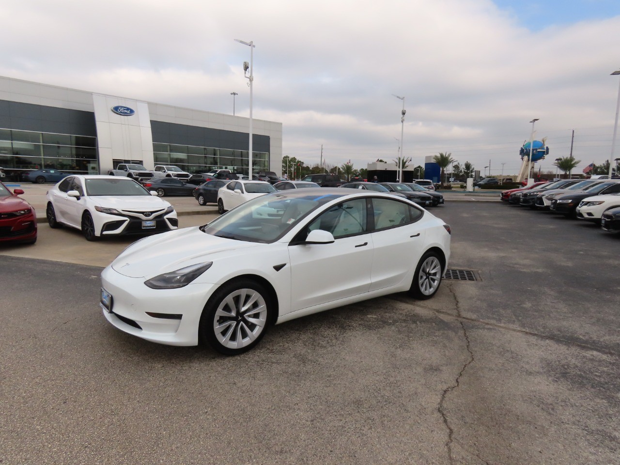 used 2023 Tesla Model 3 car, priced at $26,999