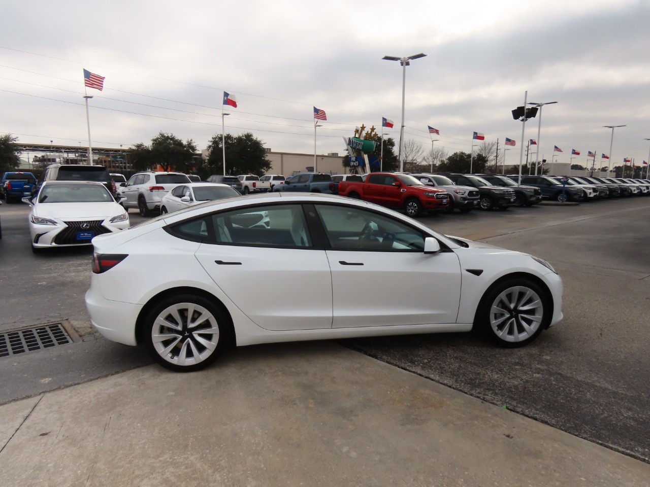 used 2023 Tesla Model 3 car, priced at $26,999