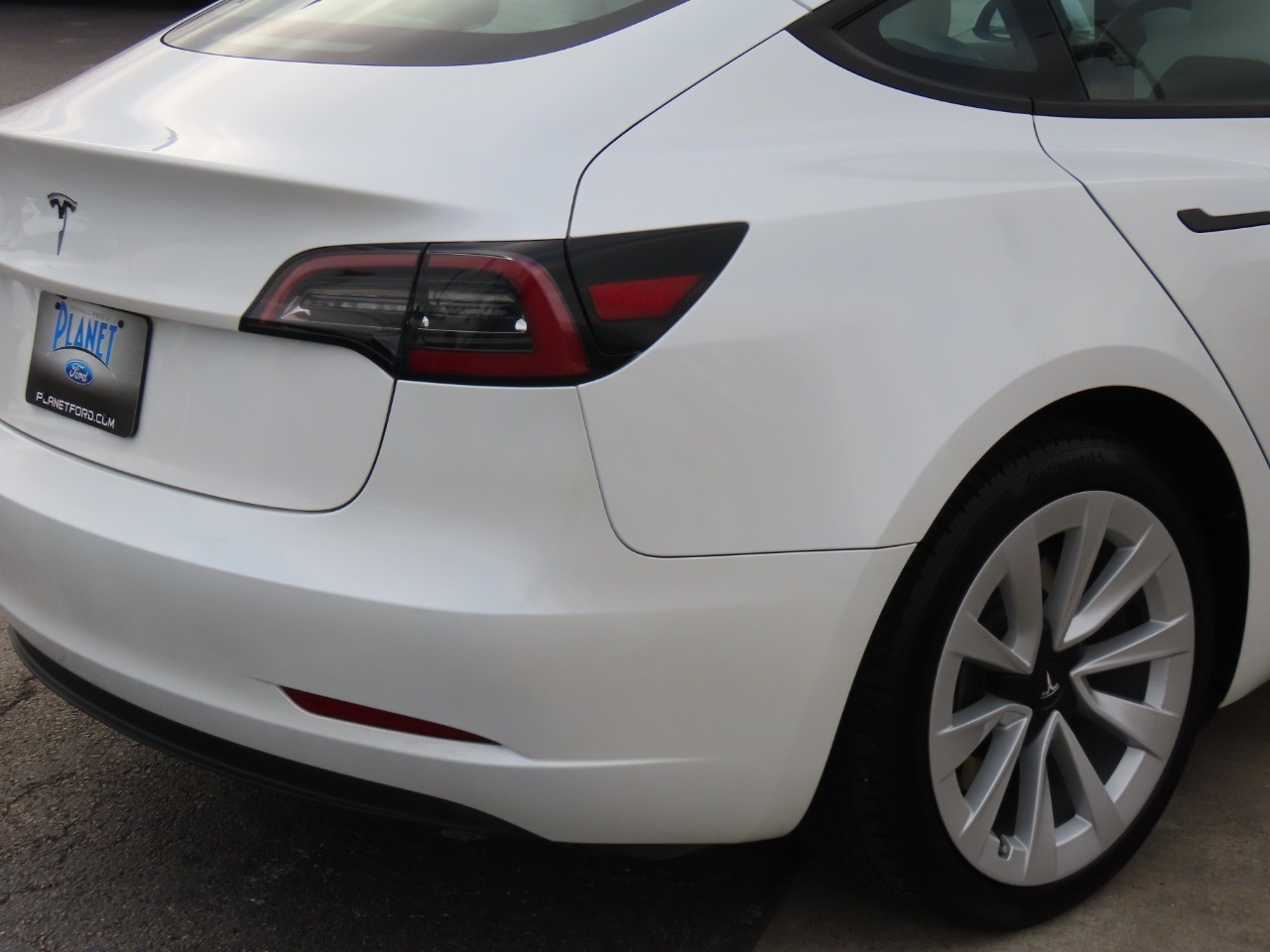 used 2023 Tesla Model 3 car, priced at $26,999