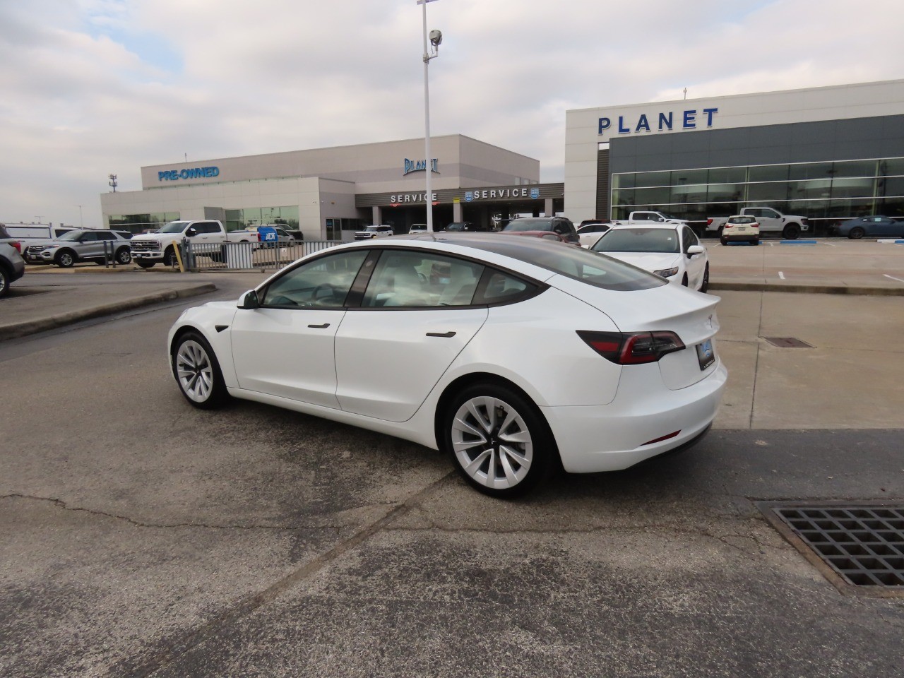 used 2023 Tesla Model 3 car, priced at $26,999