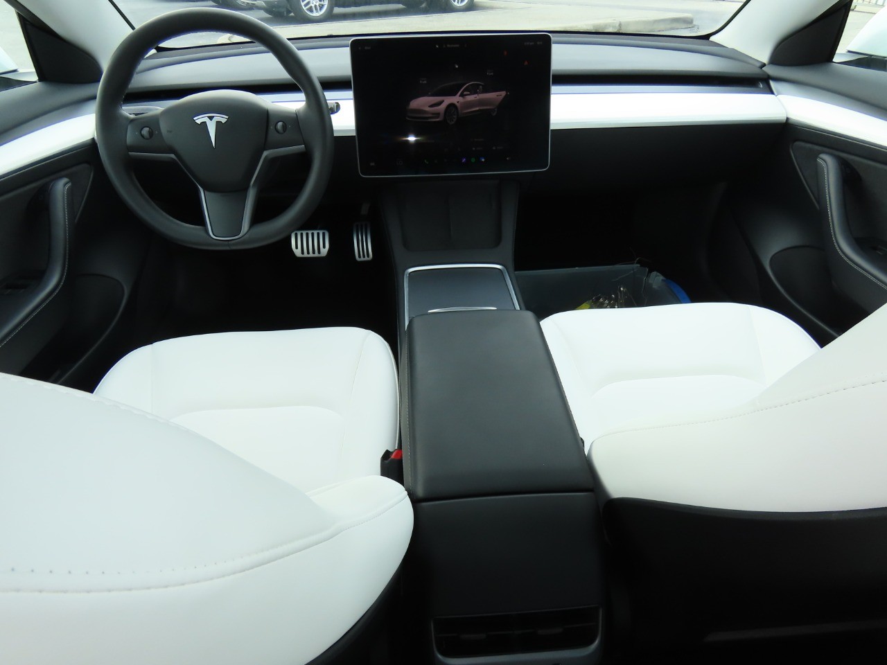 used 2023 Tesla Model 3 car, priced at $26,999